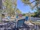 Backyard with chairs and table on a wooden deck at 10128 114Th N Ter, Largo, FL 33773