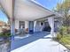 Cozy front porch with a seating area, perfect for enjoying the outdoors and neighborhood views at 10128 114Th N Ter, Largo, FL 33773