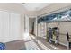 This bedroom features a lofted bed, closet, and shelving with lots of natural light at 11432 Leland Groves Dr, Riverview, FL 33579
