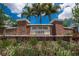 Beautiful community entrance sign surrounded by lush landscaping, enhancing the neighborhood's curb appeal at 11432 Leland Groves Dr, Riverview, FL 33579