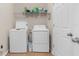 The laundry room features a full size washer and dryer at 11432 Leland Groves Dr, Riverview, FL 33579