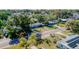 Aerial view of a home in a neighborhood with mature trees at 1211 E Camellia Dr., Brandon, FL 33510