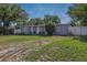 Quaint single-Gathering home with manicured lawn and cozy curb appeal under a blue sky at 1211 E Camellia Dr., Brandon, FL 33510
