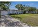Charming single-story home with a well-manicured lawn, driveway, and landscaping at 1211 E Camellia Dr., Brandon, FL 33510