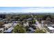 Aerial view showcases community near the coast with mature trees and water views at 1223 Union St, Clearwater, FL 33755