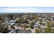 Aerial view showcases community with mature trees and glimpses of the scenic bay at 1223 Union St, Clearwater, FL 33755