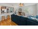 Open-concept living room features a comfortable sofa, stylish bar, and views into the kitchen at 1223 Union St, Clearwater, FL 33755