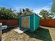Backyard shed with a fresh color palette, perfect for storage or a unique workshop area at 1223 Union St, Clearwater, FL 33755