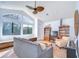 Bright living room with large windows and ample seating at 16318 Palmettoglen Ct, Lithia, FL 33547