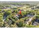 Aerial view showcasing a home surrounded by mature trees, in a peaceful neighborhood at 2612 E 26Th Ave, Tampa, FL 33605