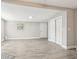 Spacious bedroom with modern flooring, neutral paint, closet, and open layout at 2726 25Th N Ave, St Petersburg, FL 33713