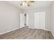 Bright bedroom with closet, neutral paint, wood floors and ceiling fan at 2726 25Th N Ave, St Petersburg, FL 33713