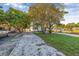 Exterior view showcasing the property's driveway and landscaping at 2734 17Th N Ave, St Petersburg, FL 33713