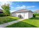 Spacious backyard showcasing lush green grass and a privacy fence, perfect for outdoor activities and relaxation at 4127 Broad Porch Run, Land O Lakes, FL 34638