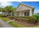 Inviting single-Gathering home exterior featuring a manicured lawn and a peaceful neighborhood setting at 4127 Broad Porch Run, Land O Lakes, FL 34638