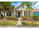 Charming single-story home with a inviting front porch and well-maintained landscaping at 4127 Broad Porch Run, Land O Lakes, FL 34638