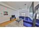Bright living room featuring modern decor and wood-style flooring at 4207 S Dale Mabry Hwy # 2412, Tampa, FL 33611