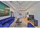 Stylish living room features an open layout, a ceiling fan, recessed lighting, and wood-look floors at 4207 S Dale Mabry Hwy # 2412, Tampa, FL 33611