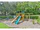 Community playground with slide, swings, and playhouse at 4207 S Dale Mabry Hwy # 2412, Tampa, FL 33611