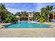 Community pool and patio with lounge seating at 4207 S Dale Mabry Hwy # 2412, Tampa, FL 33611