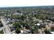 Beautiful aerial view of a residential neighborhood featuring mature trees, homes, and the subject home marked with a red arrow at 4218 2Nd S Ave, St Petersburg, FL 33711