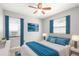 Relaxing bedroom with plush bedding, natural lighting, and decor at 4218 2Nd S Ave, St Petersburg, FL 33711