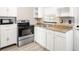 Bright kitchen featuring stainless steel appliances, modern cabinets, and stylish countertops at 4218 2Nd S Ave, St Petersburg, FL 33711