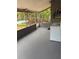 Large screened porch offers a versatile space for relaxation and storage, enhancing outdoor living at 4218 2Nd S Ave, St Petersburg, FL 33711