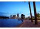 Picturesque waterfront view showcasing palm trees, bayfront buildings, and a calming body of water during the evening at 4218 2Nd S Ave, St Petersburg, FL 33711