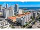 Breathtaking aerial view showcases the building's location with city skyline and waterfront views at 470 3Rd S St # 814, St Petersburg, FL 33701