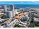 Stunning aerial view of the building near the marina and airport, with a glimpse of the ocean at 470 3Rd S St # 814, St Petersburg, FL 33701