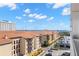 City view from the balcony showing residential buildings and open sky. Perfect for relaxation at 470 3Rd S St # 814, St Petersburg, FL 33701