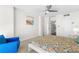 Spacious bedroom with a ceiling fan, closet, and a modern bathroom at 470 3Rd S St # 814, St Petersburg, FL 33701