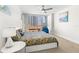 Bedroom with city views, ceiling fan, and modern decor at 470 3Rd S St # 814, St Petersburg, FL 33701