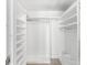 Walk-in closet with custom shelving, providing ample storage at 470 3Rd S St # 814, St Petersburg, FL 33701