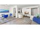 Open-concept living area with a dining table and modern decor, featuring bright, airy spaces and contemporary furnishings at 470 3Rd S St # 814, St Petersburg, FL 33701