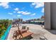 Expansive rooftop deck with lounge seating and shade, perfect for relaxation at 470 3Rd S St # 814, St Petersburg, FL 33701