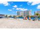 Rooftop deck area with lounge chairs, tables, and stunning city views at 470 3Rd S St # 814, St Petersburg, FL 33701