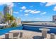 Rooftop tables with skyline and water views offer a peaceful retreat at 470 3Rd S St # 814, St Petersburg, FL 33701