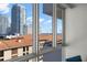 Beautiful high-rise view from a large window showing buildings and a partial ocean view at 470 3Rd S St # 814, St Petersburg, FL 33701