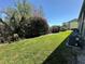 Lush backyard with mature landscaping and green lawn at 6125 113Th St # 505, Seminole, FL 33772