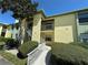 The condo features two stories and a balcony on the second floor at 6125 113Th St # 505, Seminole, FL 33772