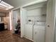 Laundry area with washer and dryer hookups and storage shelves at 6125 113Th St # 505, Seminole, FL 33772