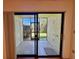 Screened patio with tile flooring and view of lush greenery, perfect for relaxing outdoors at 6125 113Th St # 505, Seminole, FL 33772