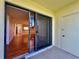 View of a patio from the interior featuring sliding door access at 6125 113Th St # 505, Seminole, FL 33772