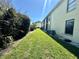 Well-maintained side yard with lush landscaping and manicured lawn alongside the building at 6125 113Th St # 505, Seminole, FL 33772