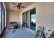 Screened patio with outdoor furniture and sliding glass door offering outdoor relaxation at 708 Barclay Wood Dr, Ruskin, FL 33570