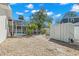 Spacious backyard featuring a rock garden, shed, and screened-in lanai, perfect for relaxing at 8236 36Th N Ave, St Petersburg, FL 33710