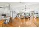 Open-concept space with hardwood floors, a fireplace, and lots of natural light at 8236 36Th N Ave, St Petersburg, FL 33710