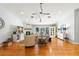 Spacious living room with hardwood floors, fireplace, and comfortable seating arrangement at 8236 36Th N Ave, St Petersburg, FL 33710